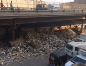 قارئ يشكوى من انتشار القمامة أسفل كوبرى محمد نجيب بالمرج
