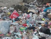 قارئ يشكو انتشار القمامة بجوار المحور فى منطقة أرض اللواء 