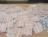 جمارك مطار برج العرب تحبط تهريب أدوية وأقراص مخدرة.. صور