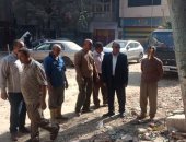 صور.. حملات نظافة إزالة إشغالات بأحياء الطالبية والعمرانية والوراق بالجيزة