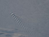 صور من محطة الفضاء الدولية لتموجات غامضة فى السحب فوق أنتاركتيكا 