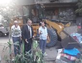 حملات لرفع الاشغالات بالدقى ومكافحة الكلاب الضالة بهضبة الأهرام 