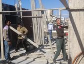 صور .. إيقاف بناء 9 عقارات مخالفة وغلق 3 محلات بأحياء الإسكندرية