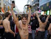 صور.. مظاهرات بالملابس الداخلية لمواجهة التغيرات المناخية فى مدريد