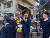 صور.. حى الدقى يشن حملة لرفع الإشغالات بشارعى التحرير والسودان