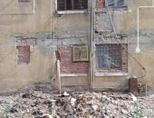 قارئ يشكو من تهالك البنية التحتية لمساكن أرض عزيز عزت بإمبابة