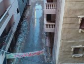 أهالى العجمى بالإسكندرية يناشدون المسئولين رصف شارع أبو النصر ورفع مياه الأمطار