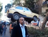 مبادرة جديدة لتجميل الدقى ورفع السيارات المتهالكة من الشوارع.. صور