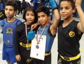 "خالد" يشارك بصور لفرحة الأطفال الحاصلين على الميداليات الذهبية ببطولة الكونغ فو