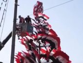أعلام العراق تزين شجرة الميلاد فى ساحة الشهداء ببغداد ..فيديو