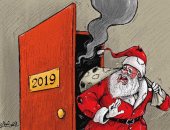 كاريكاتير صحيفة كويتية.. خروج بابا نويل حزين من عام 2019 