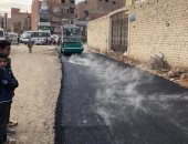 صور.. رصف شارع المستشفى وحملات لرفع مستوى النظافة فى مركز أوسيم بالجيزة