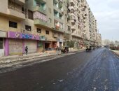 رصف شارع ترعة الزمر بالعمرانية وإيقاف أعمال بناء مخالف في أوسيم