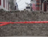 صور.. جدران من الطوب حول قرى فى الصين ونقاط تفتيش بسبب كورونا
