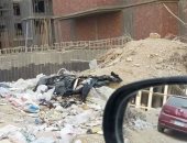 مخلفات بناء وقمامة وكلاب ضالة.. شكوى سكان الحى الإيطالى بالمعادى