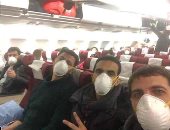 شاهد.. الفرق الطبية داخل طائرة عودة المصريين من ووهان لمصر هربا من كورونا