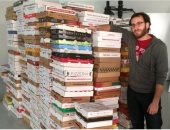 شاب أمريكى يجمع 1525 صندوقا للبيتزا من مختلف أنحاء العالم