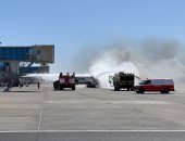 فيديو وصور .. تجربة طوارئ لمواجهة حريق طائرة بمطار الغردقة الدولى