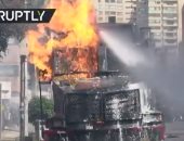 محتجون فى كولومبيا يحرقون مدرعة شرطة بزجاجات المولوتوف.. فيديو
