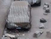 شكوى من استخدام الأحجار فى حجز أماكن انتظار السيارات بشارع أشرف نوار بالمطرية