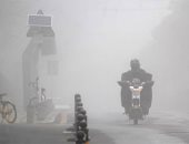 الضباب الكثيف يغطى المدينة الموبوءة فى الصين.. صور 