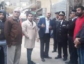 صور.. محافظة الجيزة تزيل إشغالات كوبرى مزلقان ناهيا بالدقى وبولاق