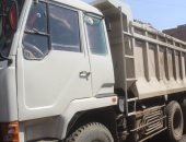 صور.. ضبط 10 سيارات نقل تلقى مخلفات الرتش فى شوارع الجيزة