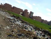 تراكم القمامة بشوارع المنيب بالجيزة والأهالى يطالبون برفعها وتوفير صناديق