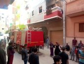 حريق هائل بشقتين سكنيتين في منطقة مساكن عثمان بقنا.. صور