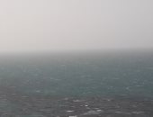 أواخر أمشير.. عاصفة ترابية تهب على الإسكندرية تملأ سماؤها بالغبار (صور)