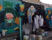 شاهد شباب محافظة الجيزة يزينون أسوار الشوارع بلوحات فنية