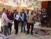 رصف شوارع حى شمال الجيزة ضمن خطة تطوير العشوائيات.. صور