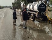 رفع مياه الأمطار وفتح طريق بلبيس - القاهرة الصحراوى بالشرقية.. صور