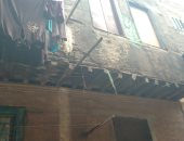 انهيار عقار جزئيا فى السيدة زينب وإخلاء سكانه دون إصابات.. صور