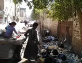 قارئ يشكو تراكم القمامة فى طريق مصر أسوان بقنا وتحرير محضرا بيئيا ضده