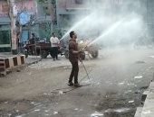 شباب عزبة الايتارية بالدقهلية يعقمون الشوارع والمنازل للتصدى لكورونا.. صور