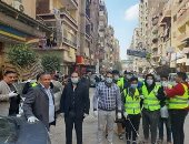مبادرة شبابية فى مدينة النهضة لتطهير المساجد والمنازل وتوزيع كمامات على الأهالى