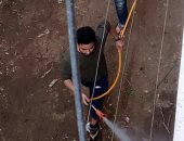 أهالى قرية بنى غنى بالمنيا يطهرون الشوارع ضد فيروس كورونا