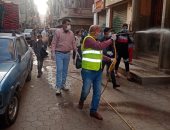 صور.. شباب شبرا يطهرون شوارع بهتيم واسكو من فيروس كورونا