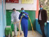 تطهير وقياس درجات الحرارة للعاملين بالمركز الاستكشافى بالغربية