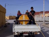 شباب بئر العبد بشمال سيناء يتسابقون فى تعقيم الشوراع لمكافحة كورونا.. صور