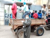 شباب قرية الفنت الشرقية ببنى سويف يعقمون شوارعهم لمواجهة كورونا