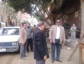 إزالة حالات تعدى على أرض زراعية بإحدى قرى المنيا .. صور 