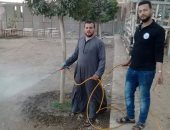 لمحاربة كورونا.. حملة شبابية بقرية البياضة فى المنيا لتطهير وتعقيم الشوارع