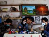 صور.. شباب غزة يبتكرون طريقة جديدة لمواجهة كورونا بالكمامات