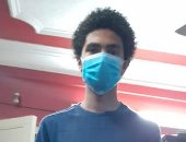 "كريم" من الجيزة يشارك بصورته بالكمامة والجوانتى للحد من العدوى بفيروس كورونا