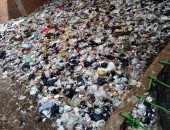 "سيبها علينا".. شكوى من تراكم القمامة فى شارع أحمد عوف بالطالبية جيزة