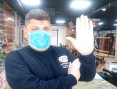 " نور " من مدينة السلام يشارك بصورته بالكمامة والجوانتى للحد من كورونا