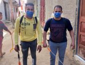  شباب قرية طرابمبا بالبحيرة يطهرون الشوارع  ضد فيروس كورونا