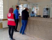 الهلال الأحمر بشمال سيناء يدفع بـ25 متطوعا لتنظيم صرف المعاشات.. صور